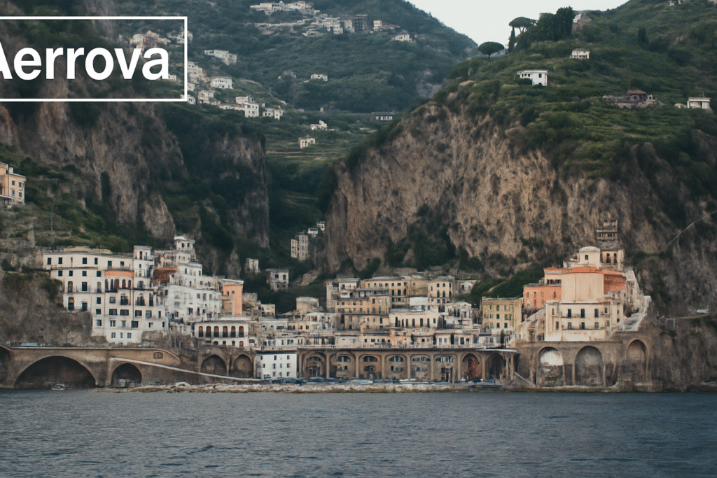 Colorful cliffside buildings overlooking the sparkling Mediterranean Sea along Italy’s Amalfi Coast