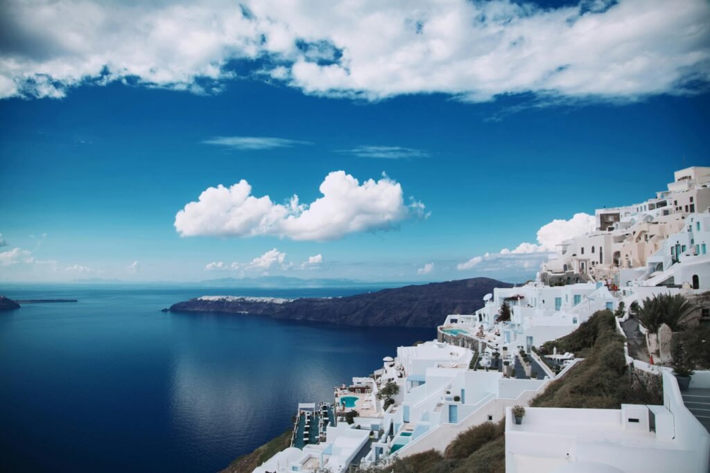 Greece – Ancient History and Iconic Island Views White buildings and blue domes in Santorini, Greece